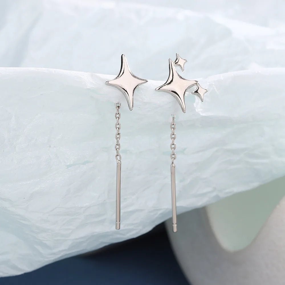 Magnifique boucle d'oreille en forme d'étoile