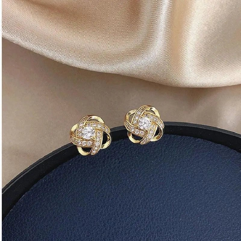Boucles d'oreilles Puces Spirales Fleurs Cristal Dorées